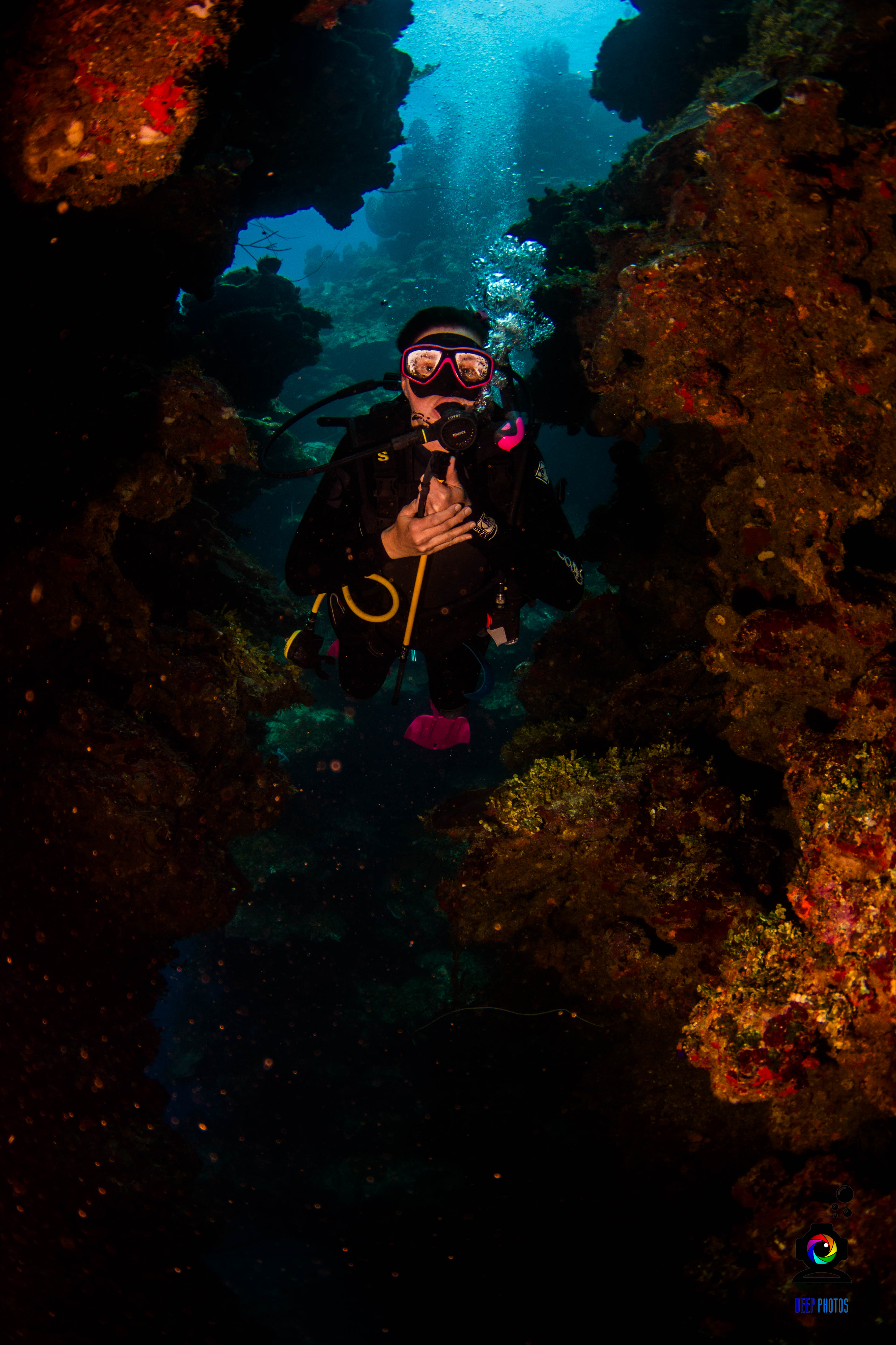 Kristie Spear Hunting for Lionfish while Diving in Roatan